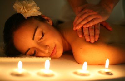 Woman during a massage treatment in spa.